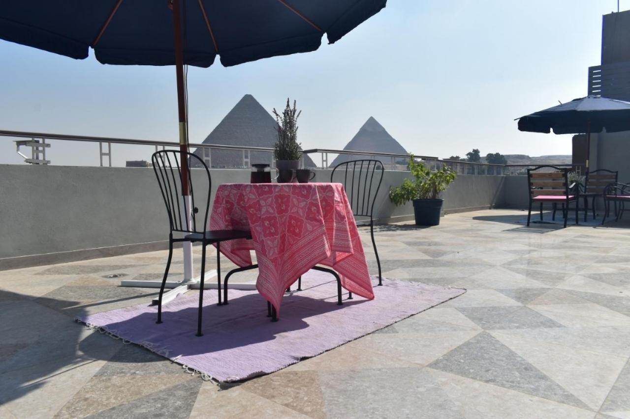 Appartamento La Perle Pyramids Il Il Cairo Esterno foto